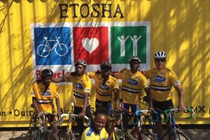 A BMX racing team in Namibia at its latest shipping container, which was turned into a bike shop.